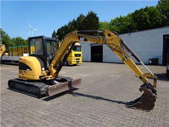 Caterpillar 304C CR mit diversen Equipment