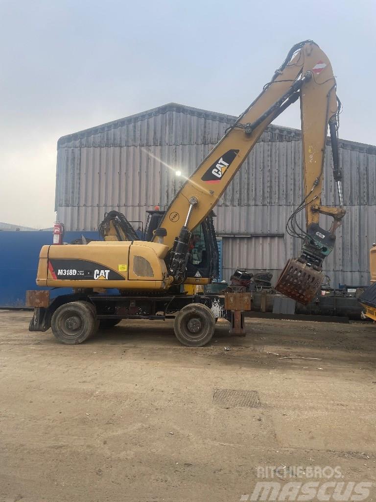 CAT 318 dmh Andere