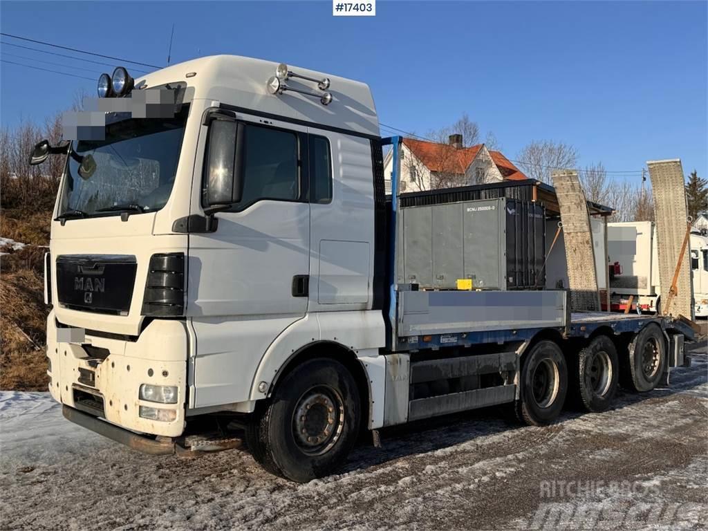 MAN TGX 35.480 8x4 flatbed truck w/ driving bridges Pritschenwagen/Pritschenwagen mit Seitenklappe